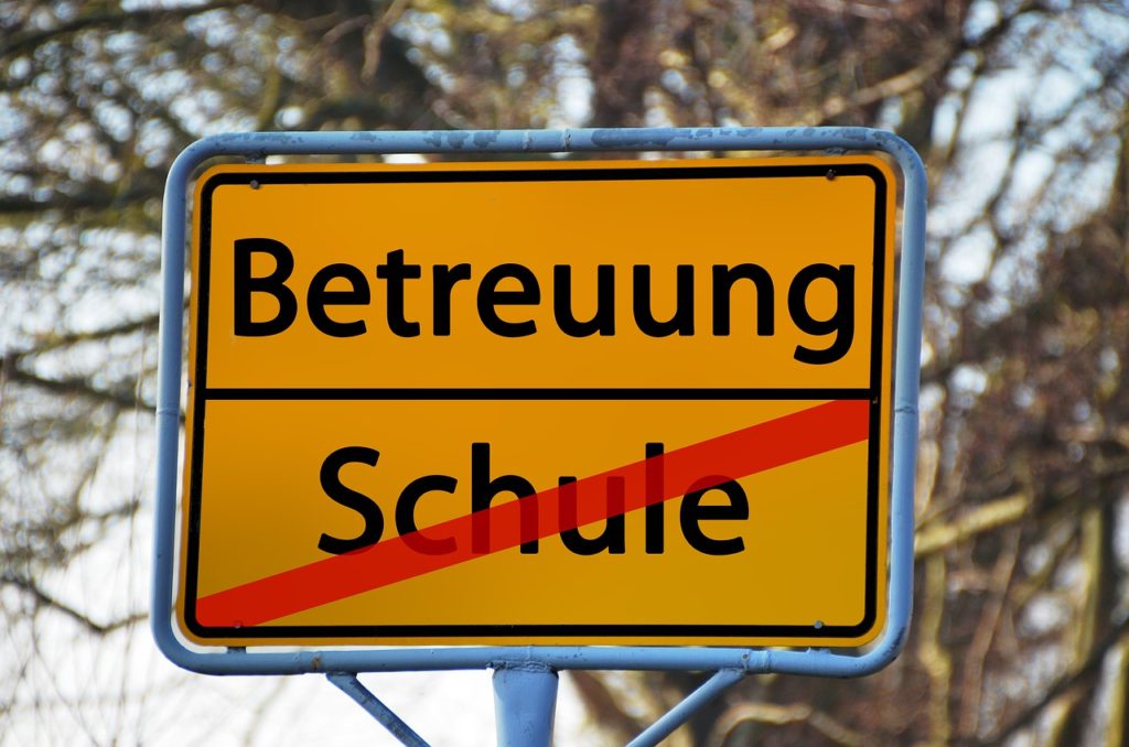 Town Sign Place Name Sign School - geralt / Pixabay